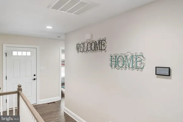 a view of an entryway with stairs