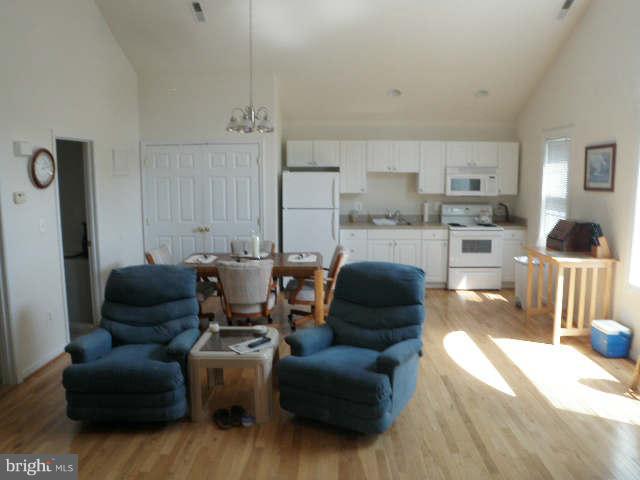 86 Johnson Road Pasadena, MD 21122 - Photo 28 of 30 VAULTED FAMILY ROOM & KITCHEN IN THE APARTMENT