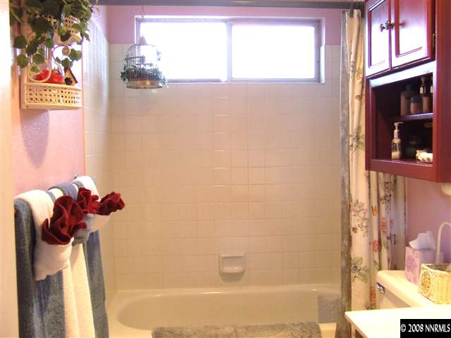 3560 Brant Street Reno, NV 89508 - Photo 8 of 9 a bath room with a bathtub