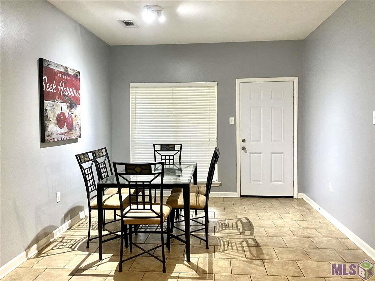 9628 Arnold Road Denham Springs, LA 70726 - Photo 7 of 10 Freshly painted dining room