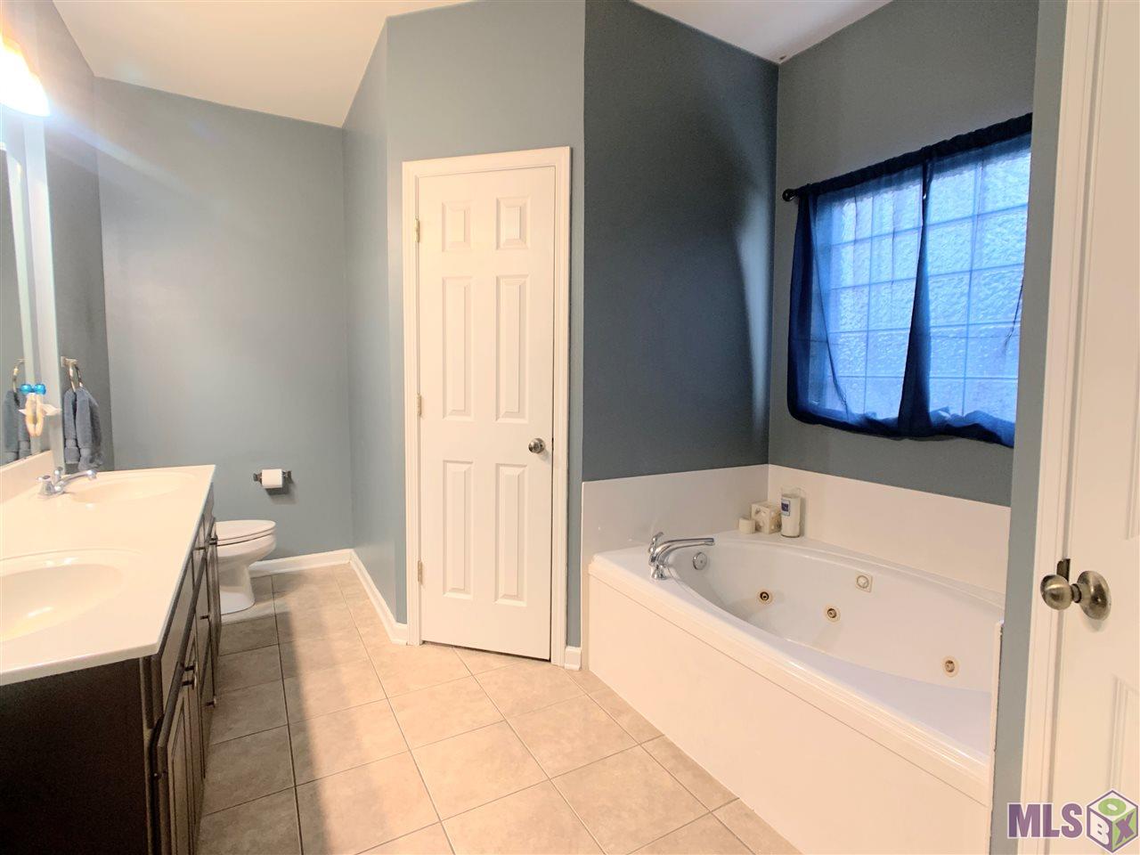 9628 Arnold Road Denham Springs, LA 70726 - Photo 8 of 10 Large master bath with double vanities
