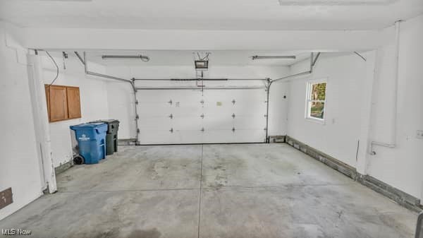 6179 Case Road North Ridgeville, OH 44039 - Photo 8 of 29 Garage featuring a garage door opener