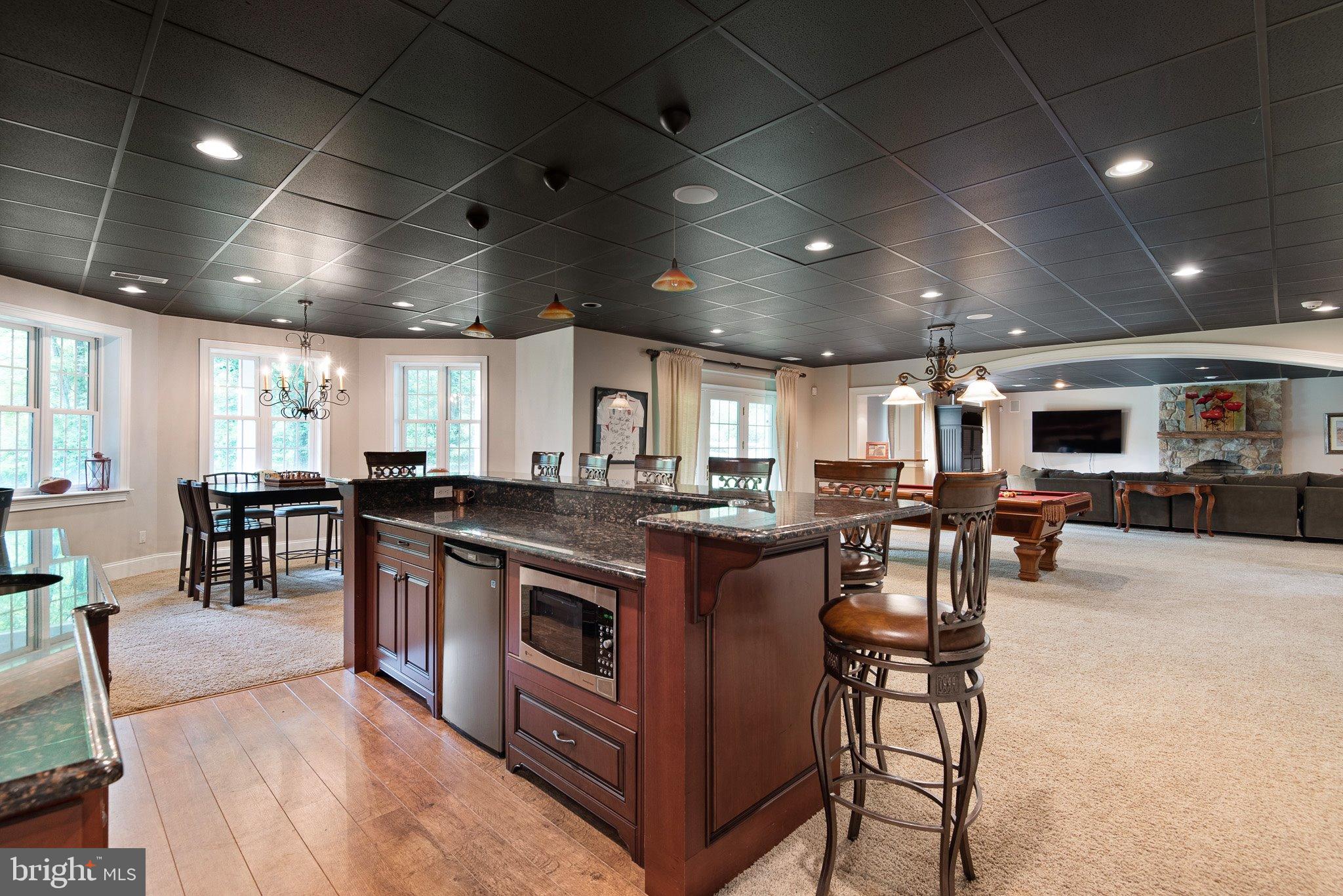104 Timber Ridge Lane Chadds Ford, PA 19317 - Photo 51 of 65 View from bar to gaming area and a family lounge