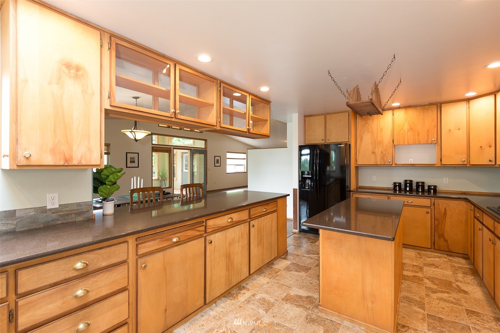 313 Applegate Lane Sequim, WA 98382 - Photo 12 of 40 a kitchen with stainless steel appliances granite countertop a sink and cabinets