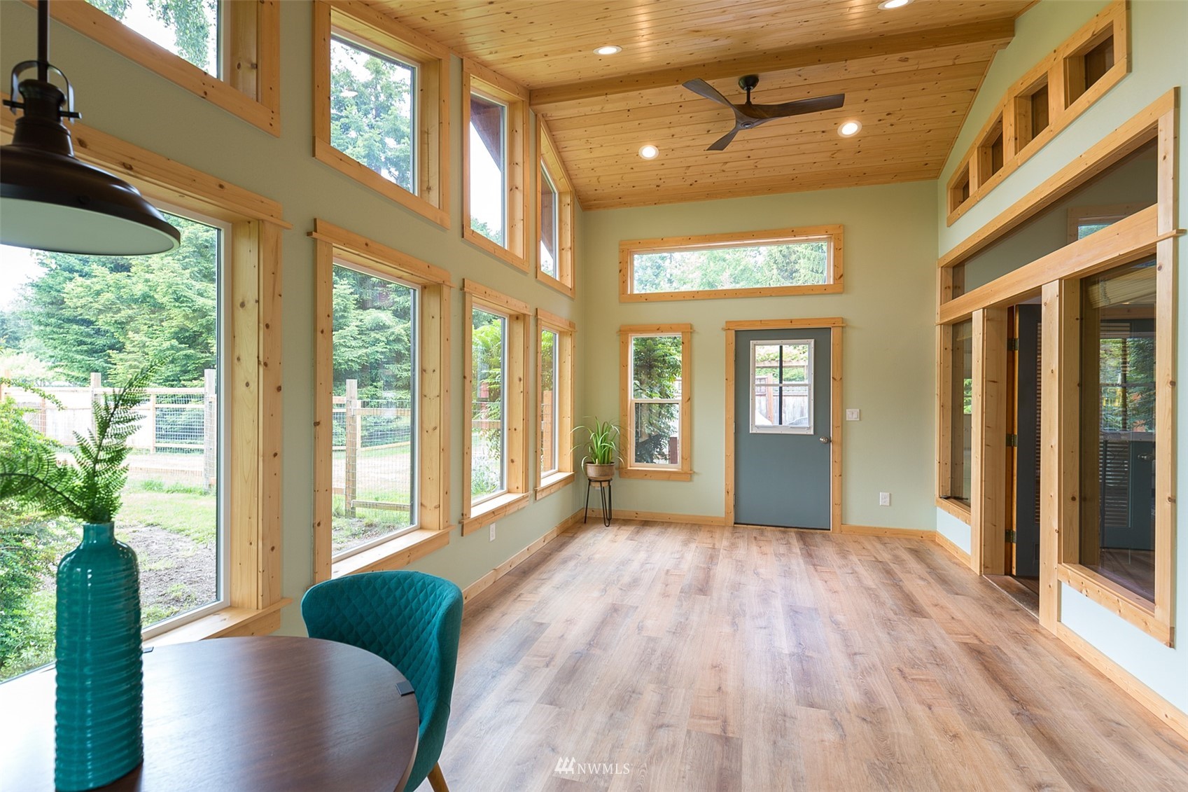313 Applegate Lane Sequim, WA 98382 - Photo 15 of 40 a view of livingroom with furniture wooden floor and windows