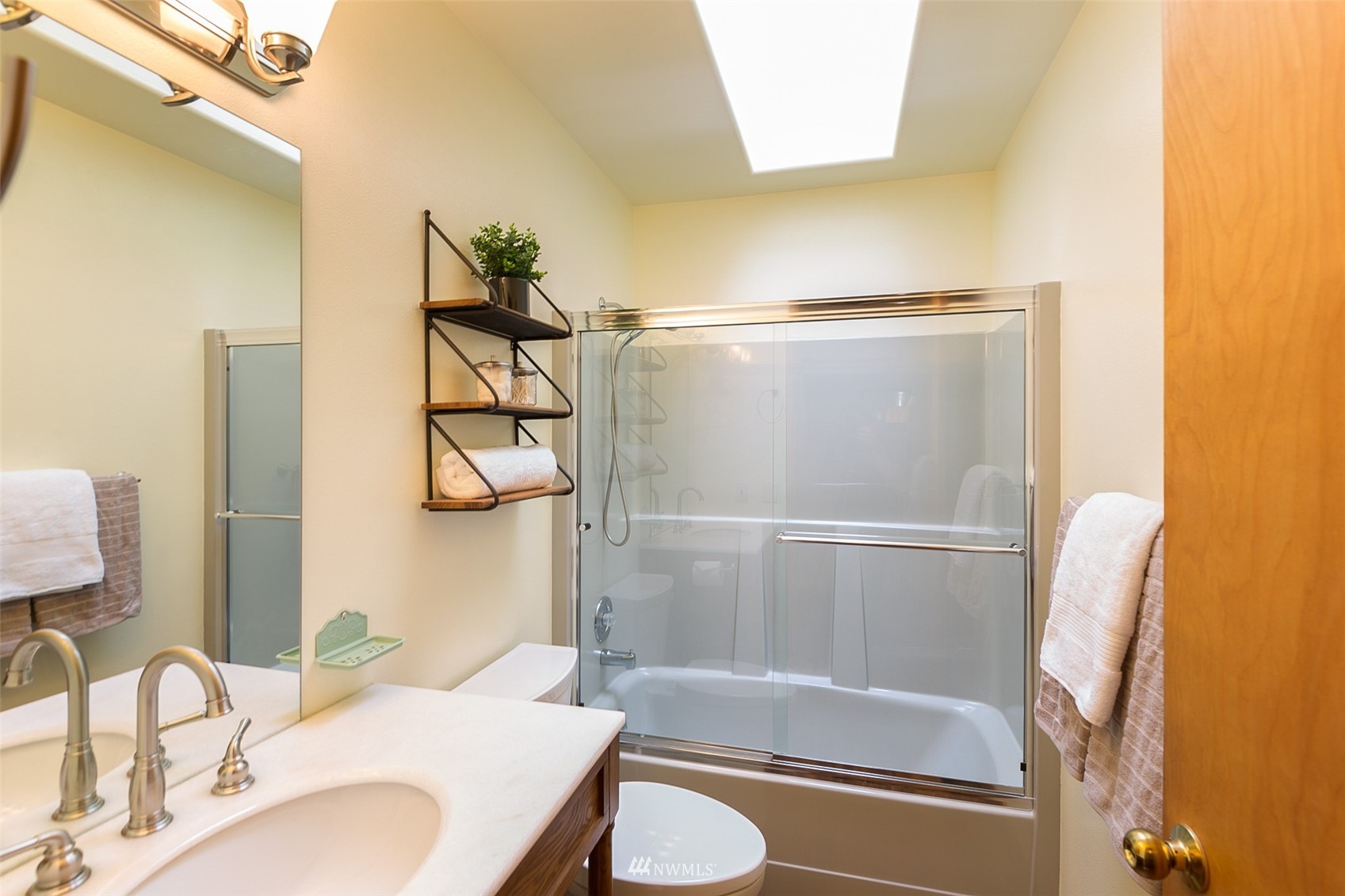 313 Applegate Lane Sequim, WA 98382 - Photo 23 of 40 a bathroom with a sink toilet and shower