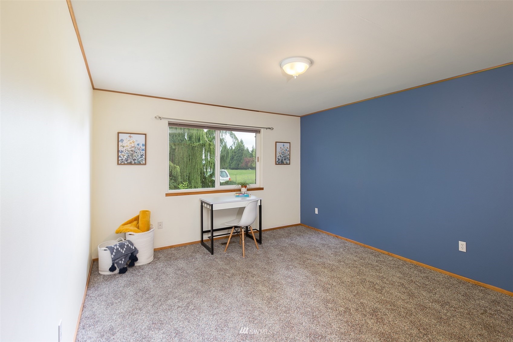 313 Applegate Lane Sequim, WA 98382 - Photo 24 of 40 a living room with furniture and a window