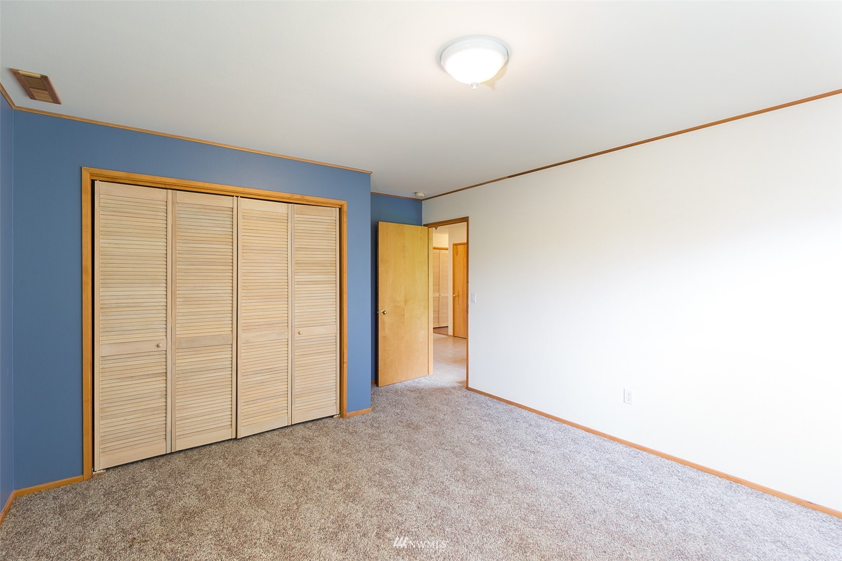 313 Applegate Lane Sequim, WA 98382 - Photo 25 of 40 an empty room with sliding door