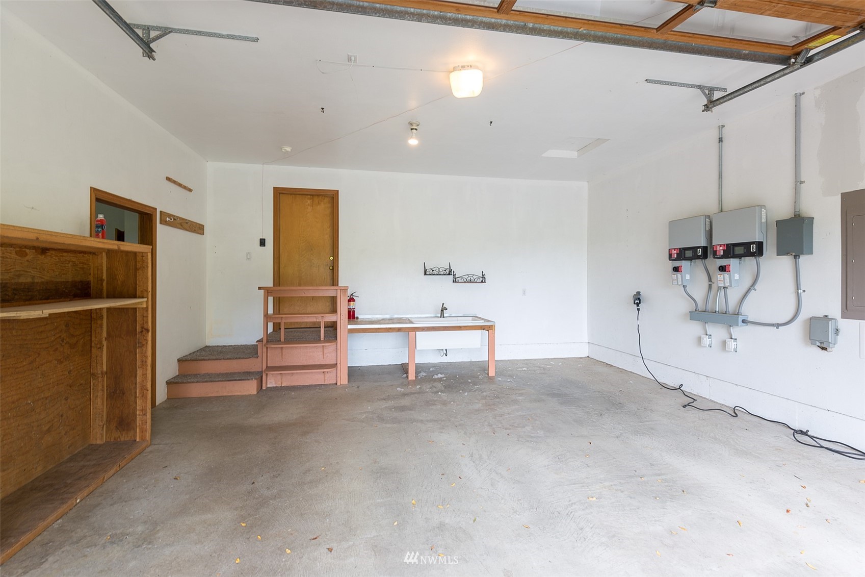 313 Applegate Lane Sequim, WA 98382 - Photo 26 of 40 a view of a livingroom with furniture and staircase