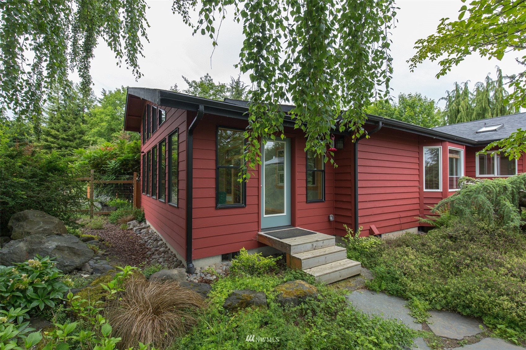 313 Applegate Lane Sequim, WA 98382 - Photo 37 of 40 a front view of a house with garden