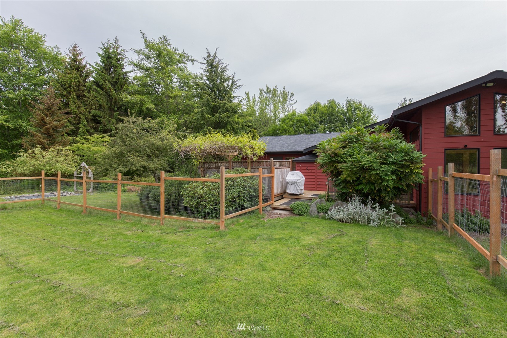 313 Applegate Lane Sequim, WA 98382 - Photo 39 of 40 a view of a house with a yard