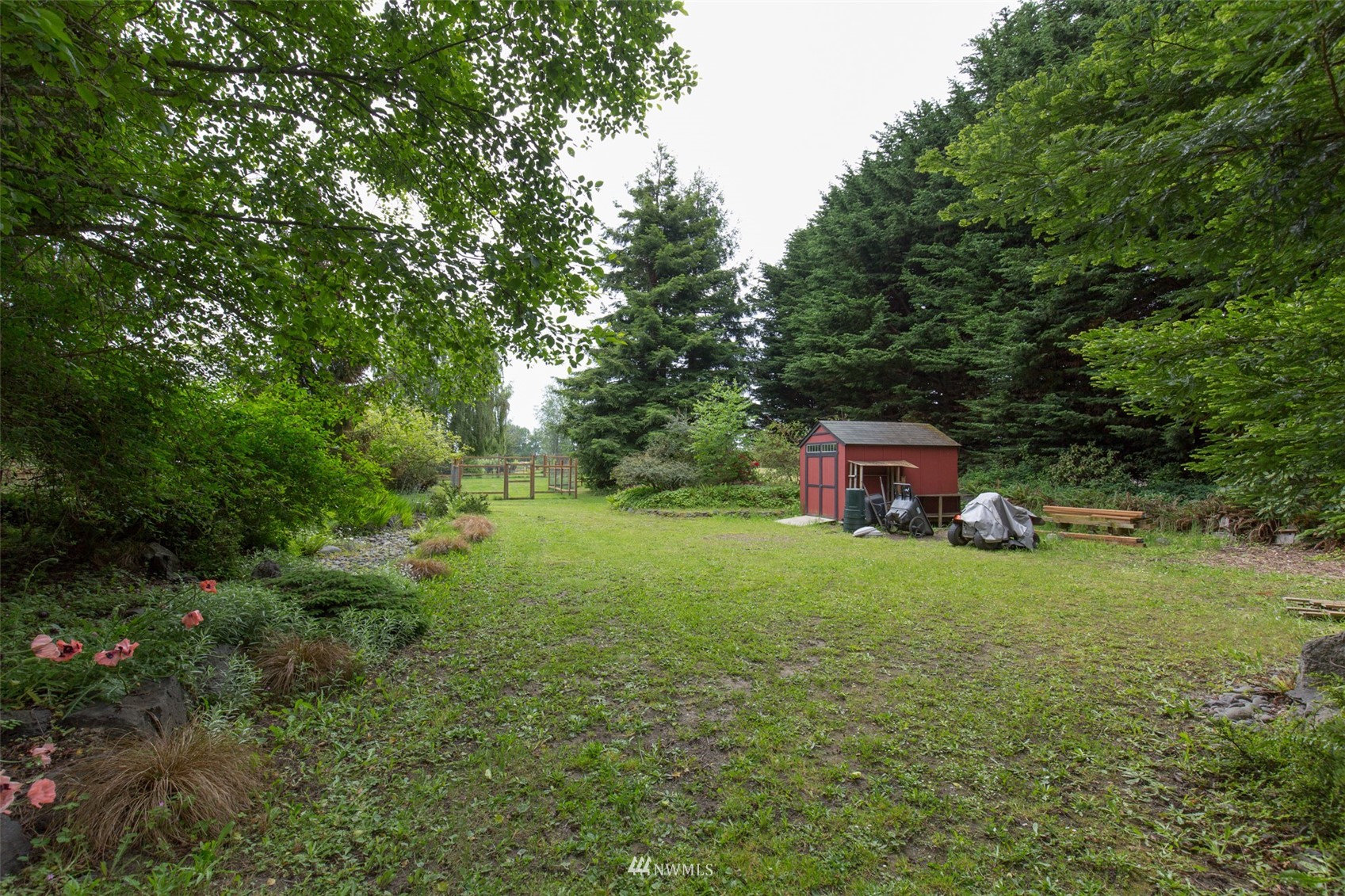313 Applegate Lane Sequim, WA 98382 - Photo 40 of 40 a fire hydrant in the middle of a field