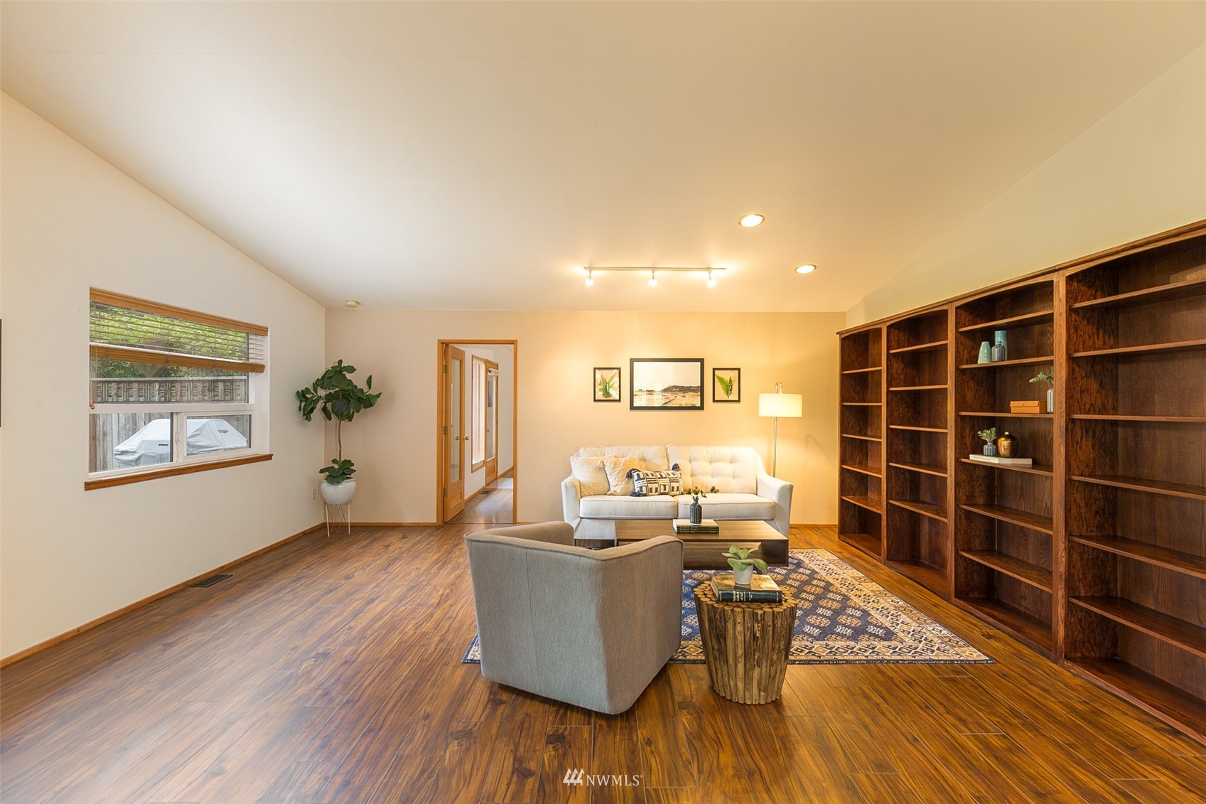 313 Applegate Lane Sequim, WA 98382 - Photo 5 of 40 a living room with furniture a wooden floor and a window