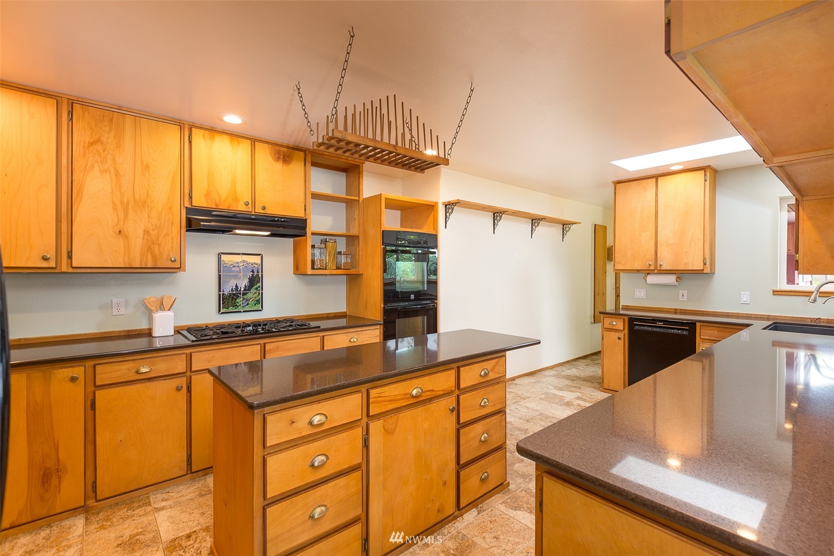 313 Applegate Lane Sequim, WA 98382 - Photo 10 of 40 a kitchen with stainless steel appliances granite countertop sink stove and cabinets
