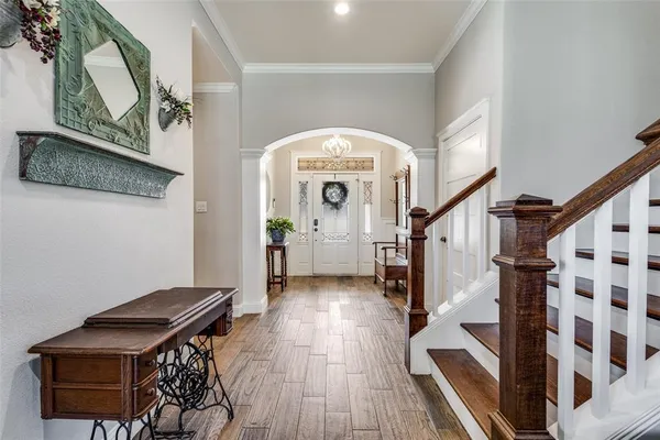 a view of entryway with wooden floor