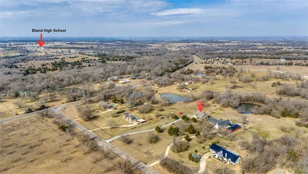 a view of residential houses with lake view