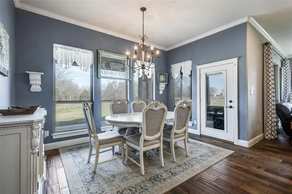 a living room with furniture fireplace and flat screen tv
