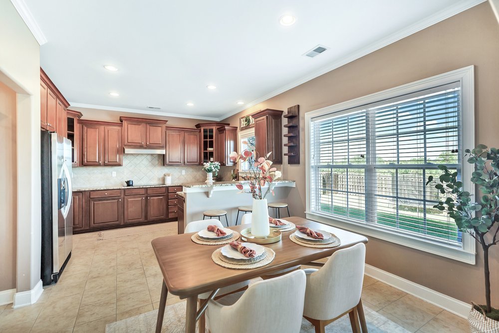 15 Fawn Hill Drive Anderson, SC 29621 - Photo 9 of 38 This spacious kitchen and dining area offers functional design and abundant natural light.
