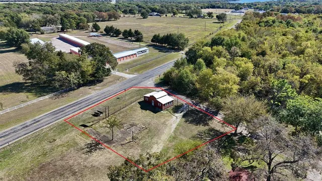 a view of a yard with an outdoor space