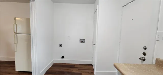 a bathroom with a tub and shower