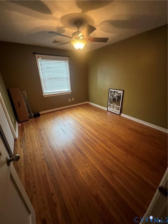 2307 Adelphi Road Henrico, VA 23229 - Photo 10 of 15 a view of a livingroom with wooden floor and window