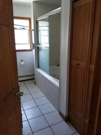 a bathroom with a bathtub