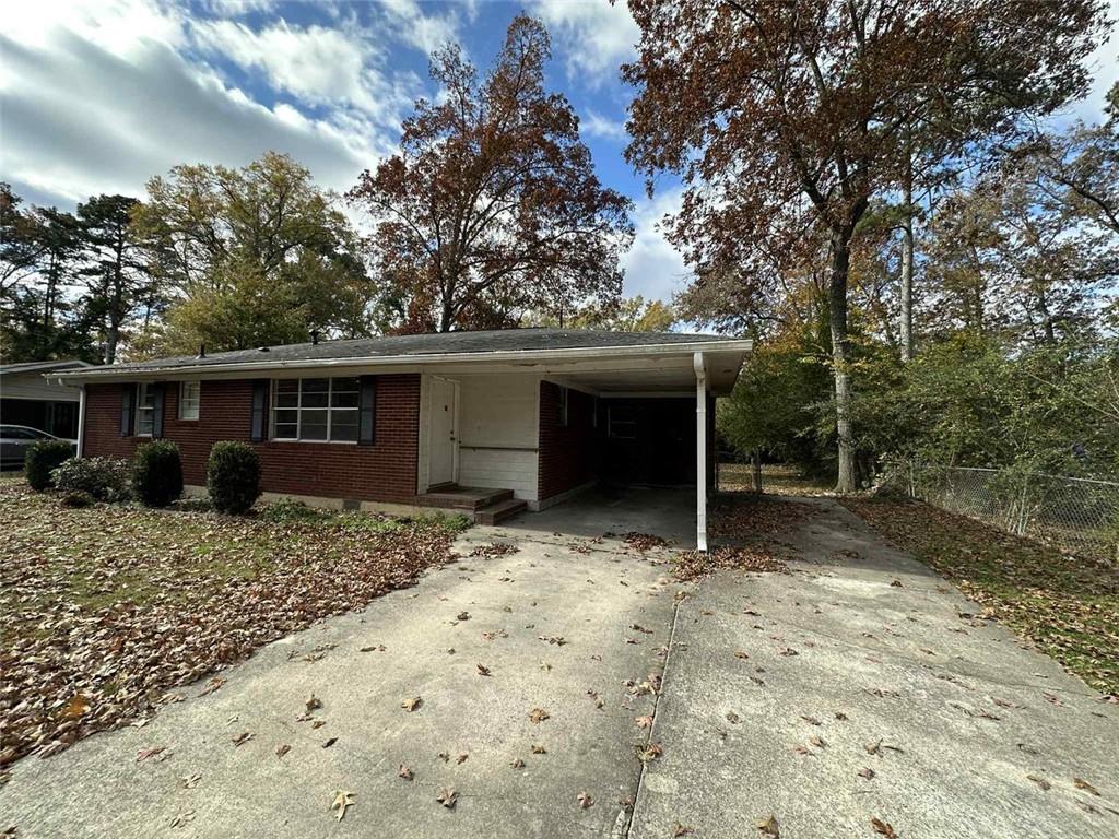 115 Mathis Drive Northwest Rome, GA 30165 - Photo 3 of 16 a house with trees in the background