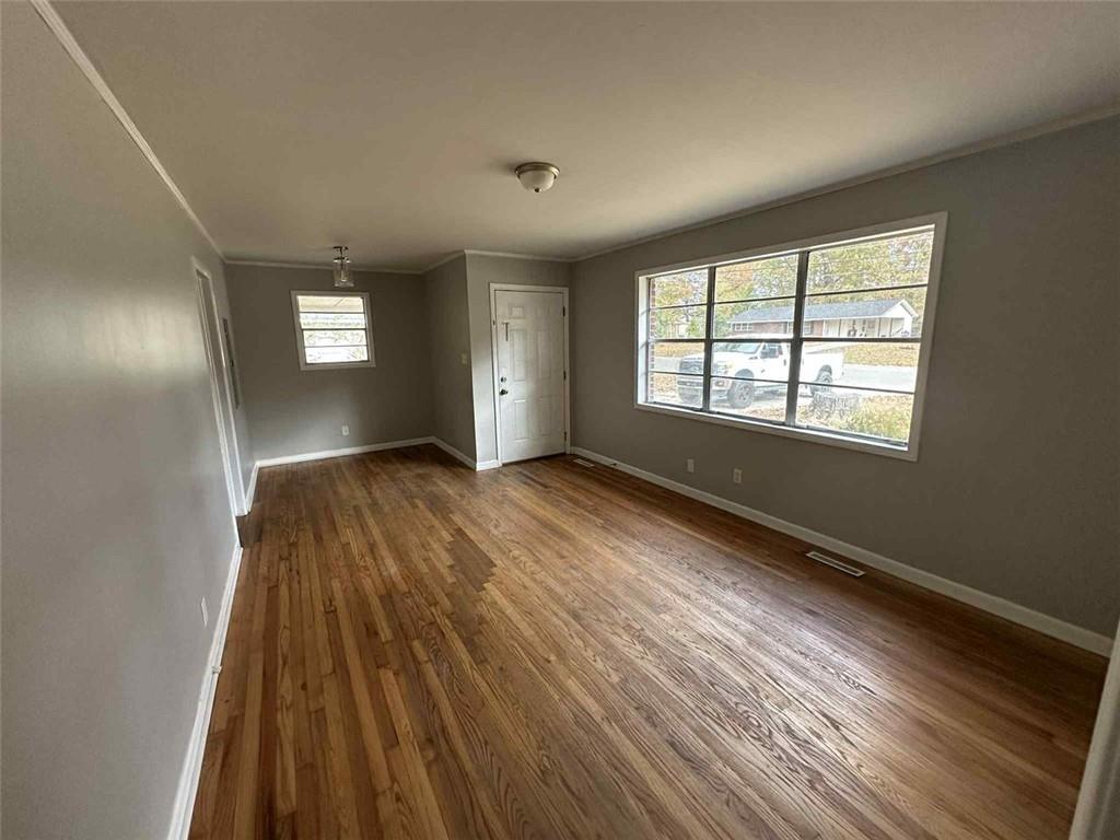 115 Mathis Drive Northwest Rome, GA 30165 - Photo 5 of 16 a view of an empty room and window