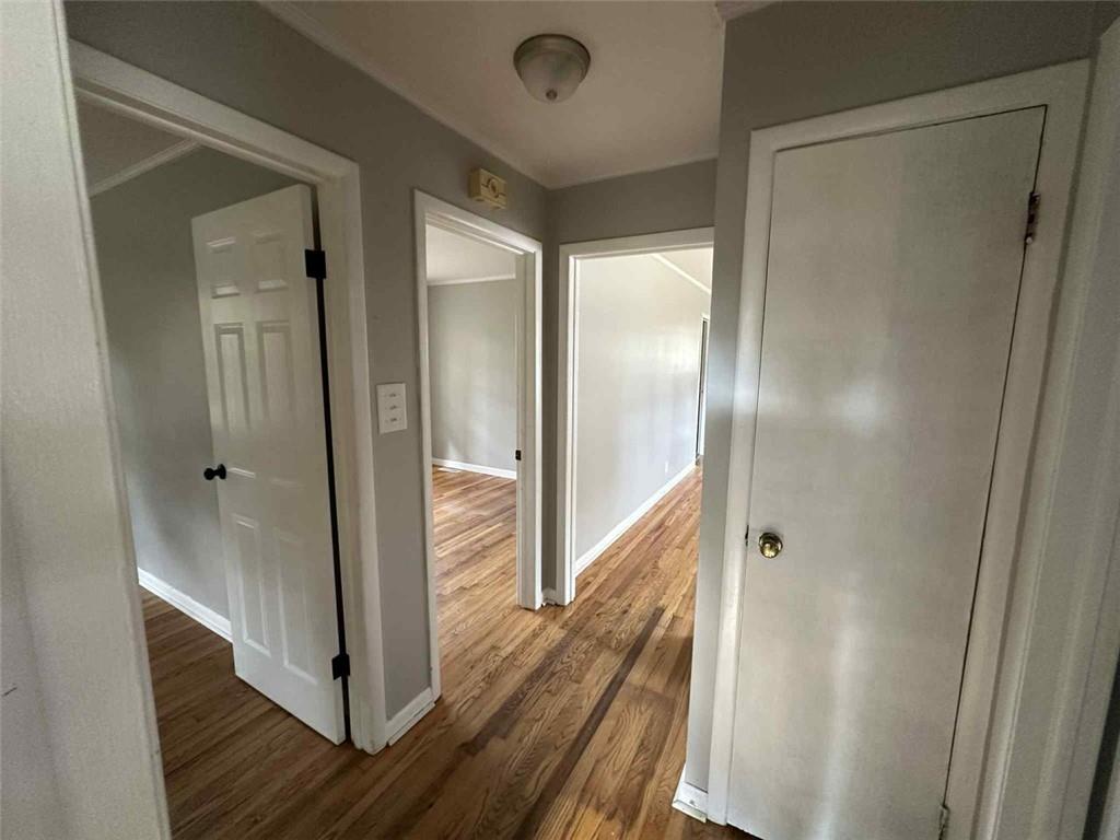 115 Mathis Drive Northwest Rome, GA 30165 - Photo 9 of 16 a view of a hallway with wooden floor