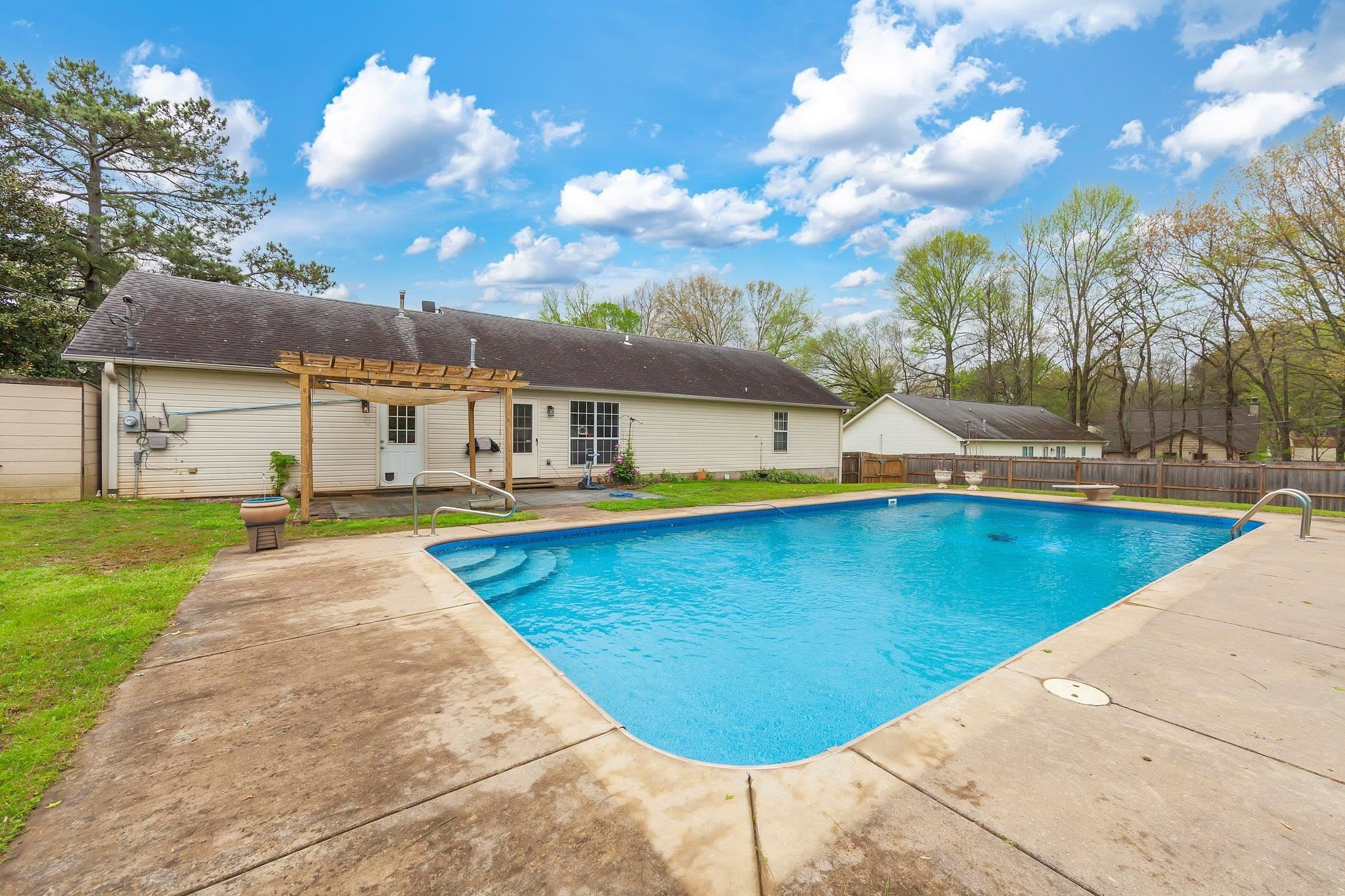 112 Penny Lane Jackson, TN 38301 - Photo 15 of 16 a view of a patio with swimming pool