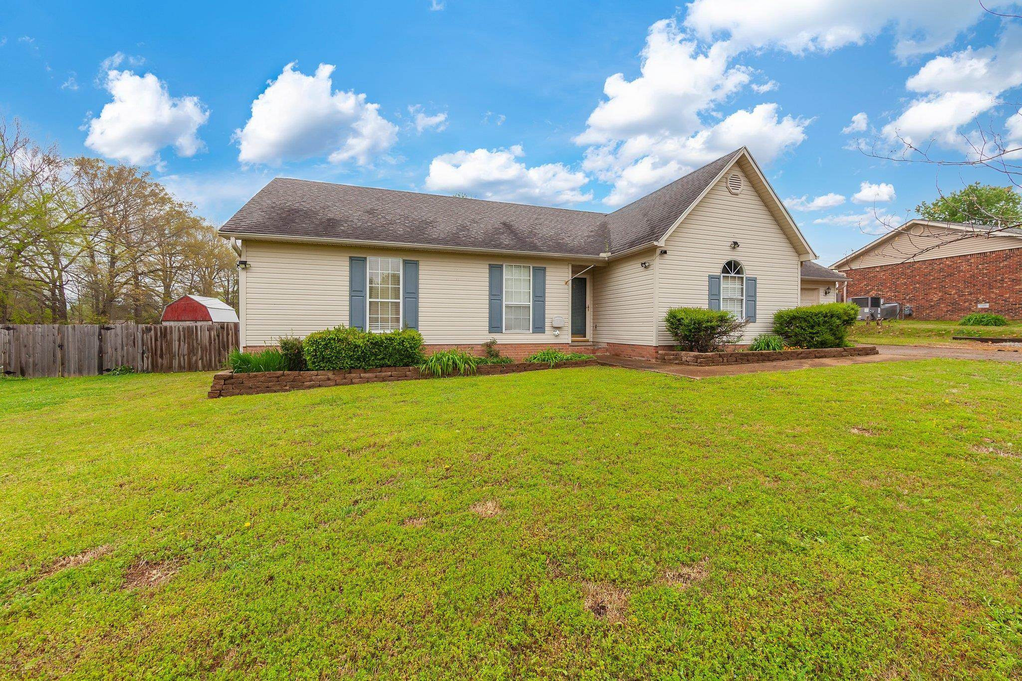 112 Penny Lane Jackson, TN 38301 - Photo 2 of 16 a front view of house with yard and green space