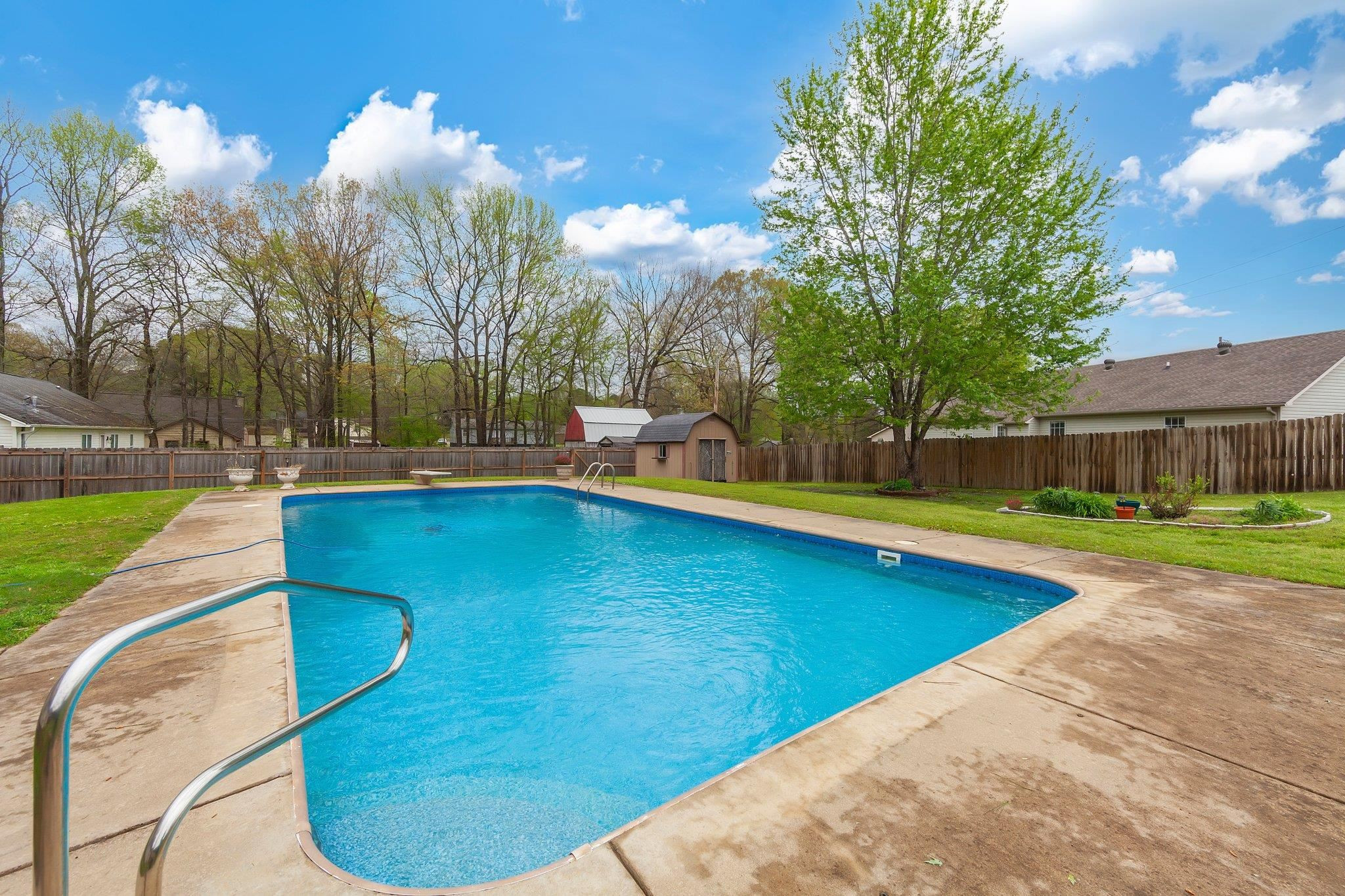 112 Penny Lane Jackson, TN 38301 - Photo 3 of 16 a view of a swimming pool with a patio