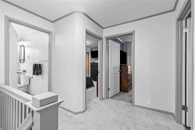 a view of a bathroom from the hallway