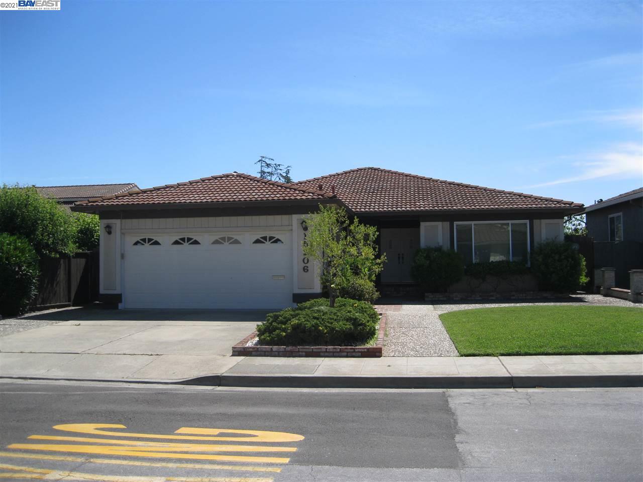 Washington Manor San Leandro, CA 94579 - Photo 1 of 18 a front view of a house with a garden