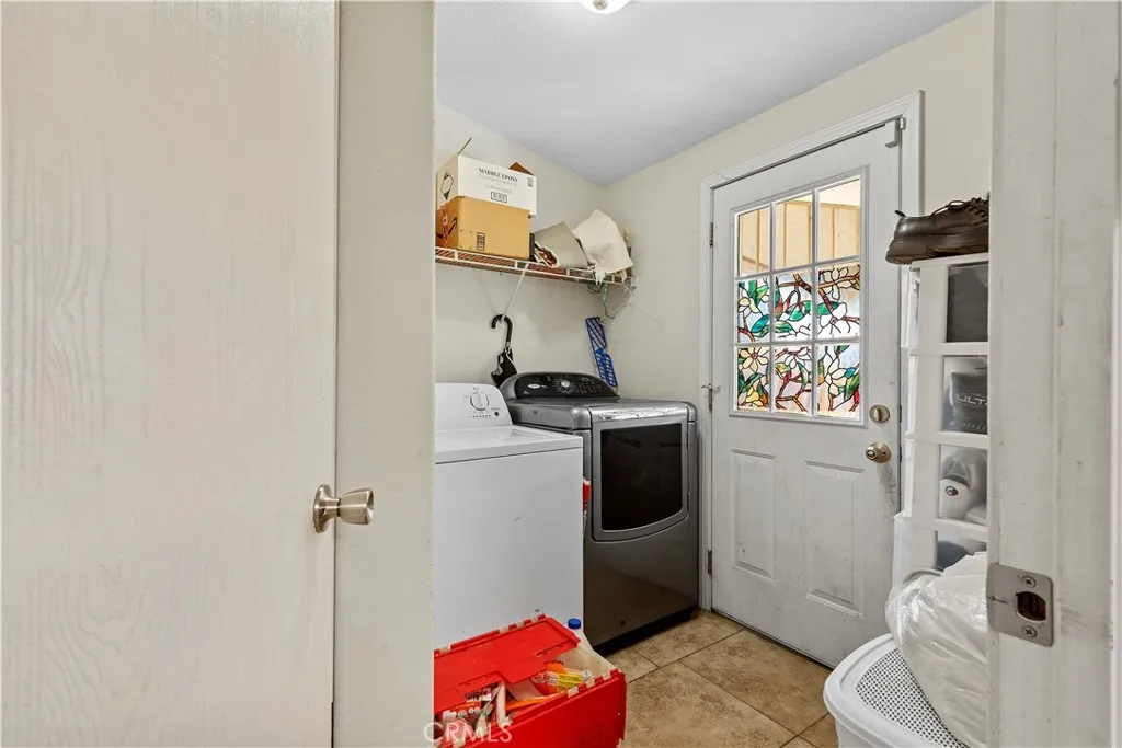 4801 West 1st Street Santa Ana, CA 92703 - Photo 5 of 19 a bathroom with a sink toilet and shower