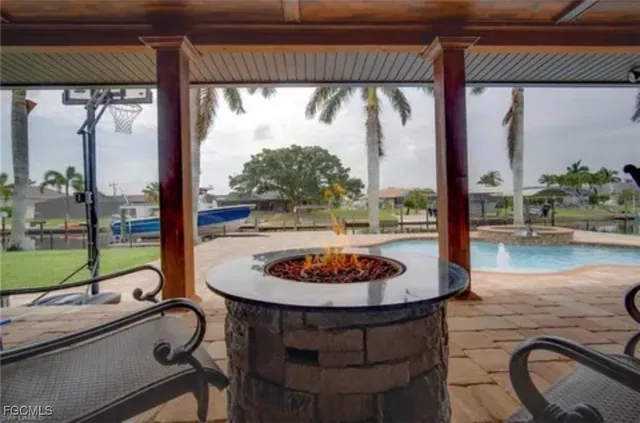 a dining room with a table and chairs