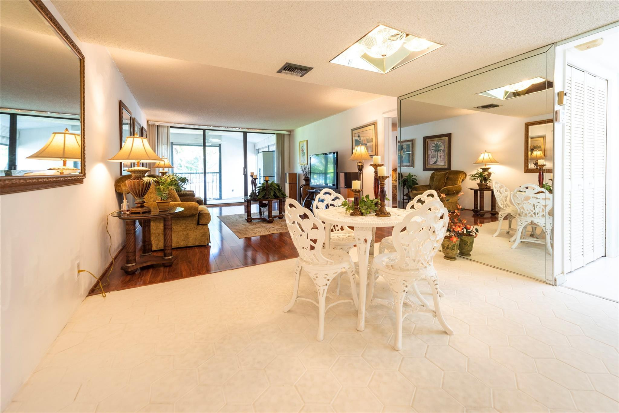 16325 Golf Club Road, Unit 210 Weston, FL 33326 - Photo 4 of 24 a view of a dining room with furniture window and outside view