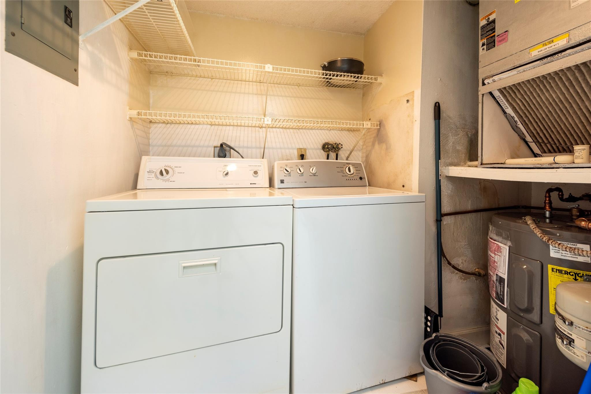 16325 Golf Club Road, Unit 210 Weston, FL 33326 - Photo 9 of 24 a utility room with dryer and washer