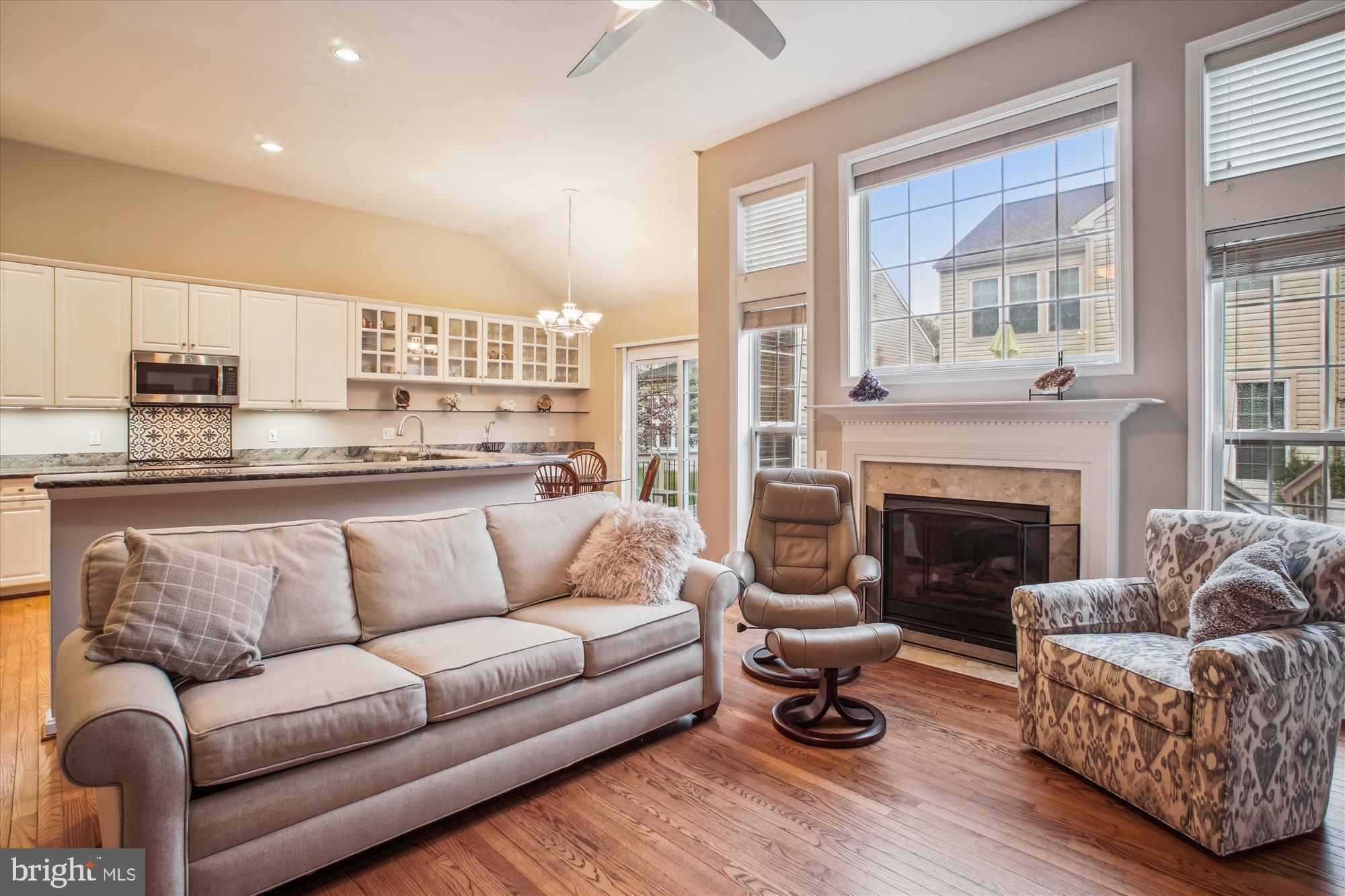 2454 Arctic Fox Way Reston, VA 20191 - Photo 12 of 54 a living room with furniture and a fireplace