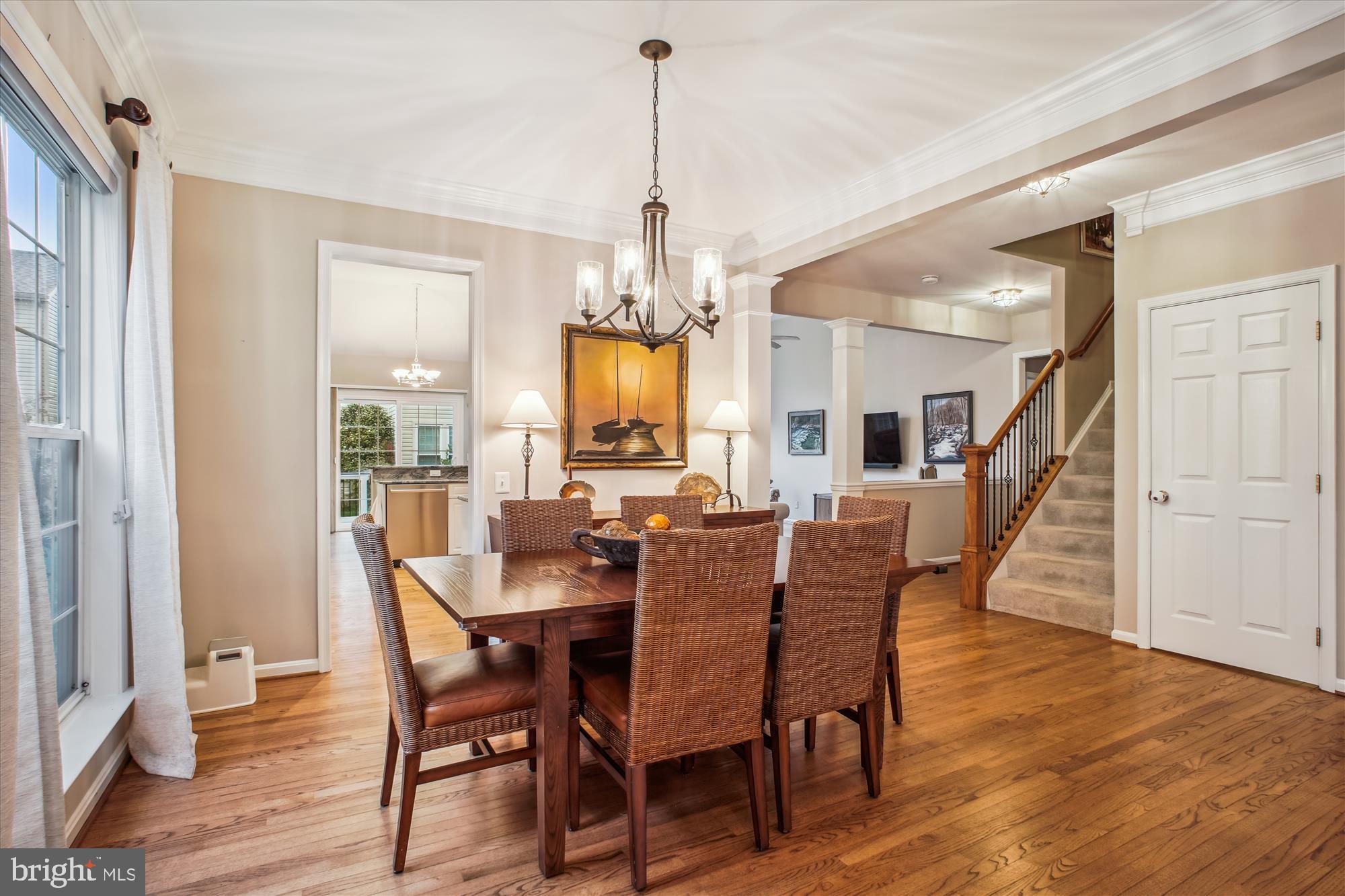 2454 Arctic Fox Way Reston, VA 20191 - Photo 14 of 54 a view of a dining room with furniture window and wooden floor