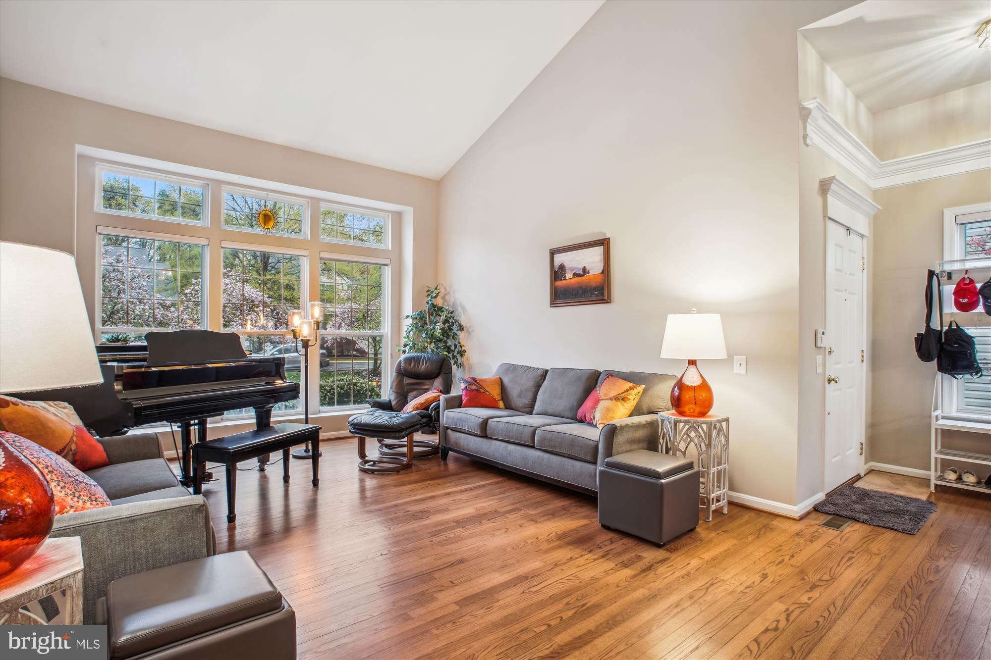 2454 Arctic Fox Way Reston, VA 20191 - Photo 16 of 54 a living room with furniture and a large window