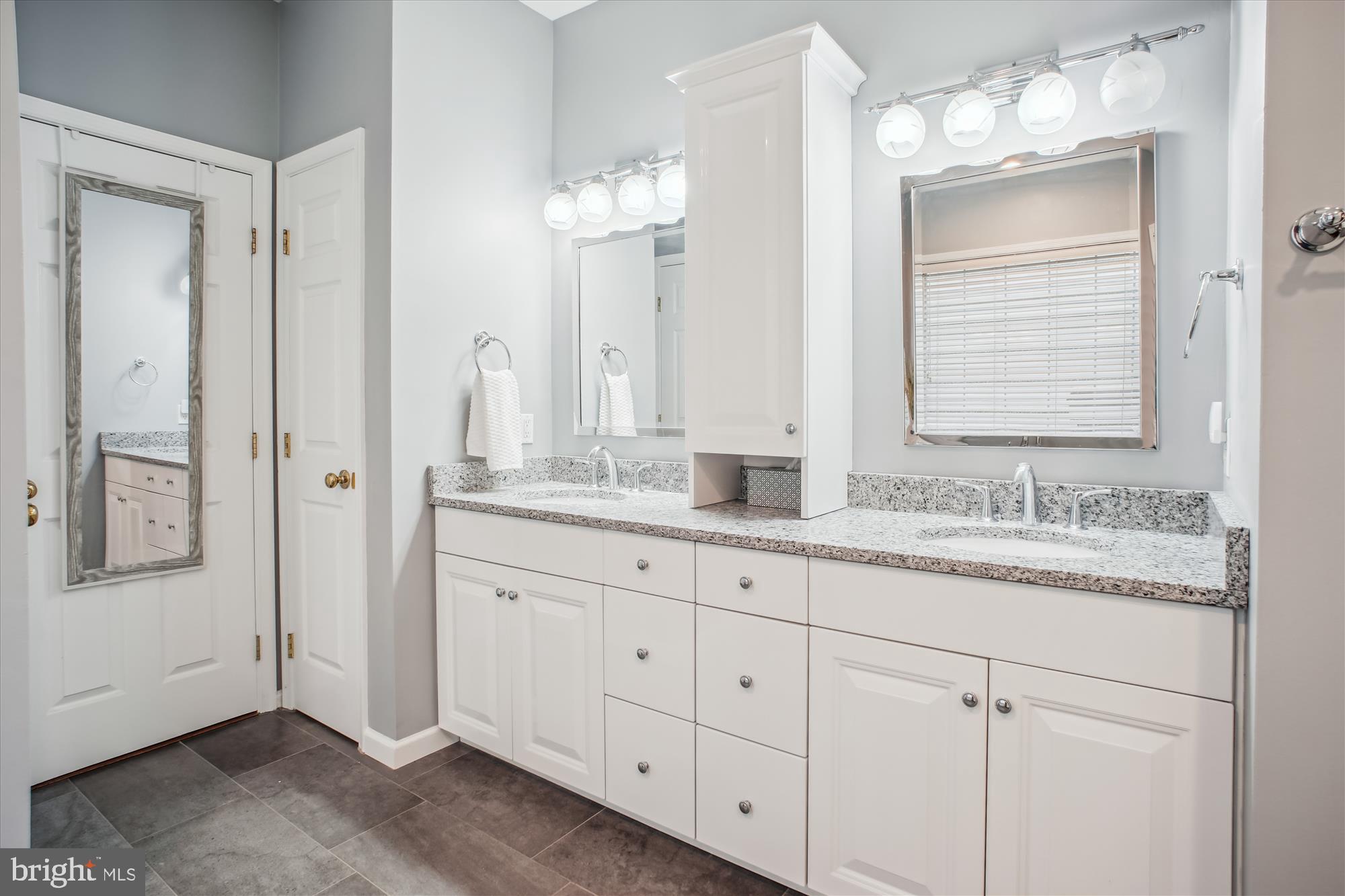 2454 Arctic Fox Way Reston, VA 20191 - Photo 24 of 54 a bathroom with a granite countertop double vanity sink mirror and