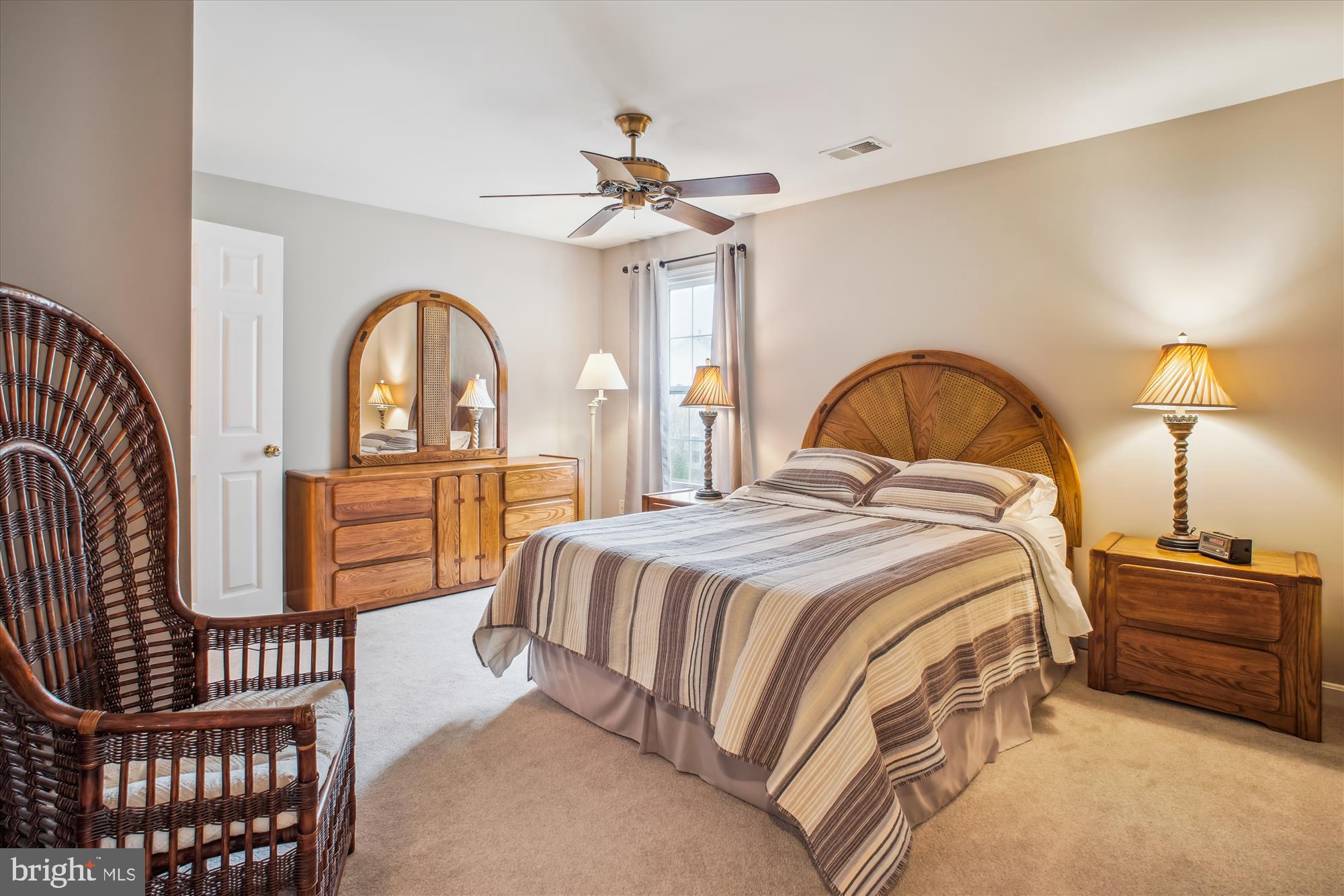 2454 Arctic Fox Way Reston, VA 20191 - Photo 31 of 54 a bedroom with bed and a chandelier