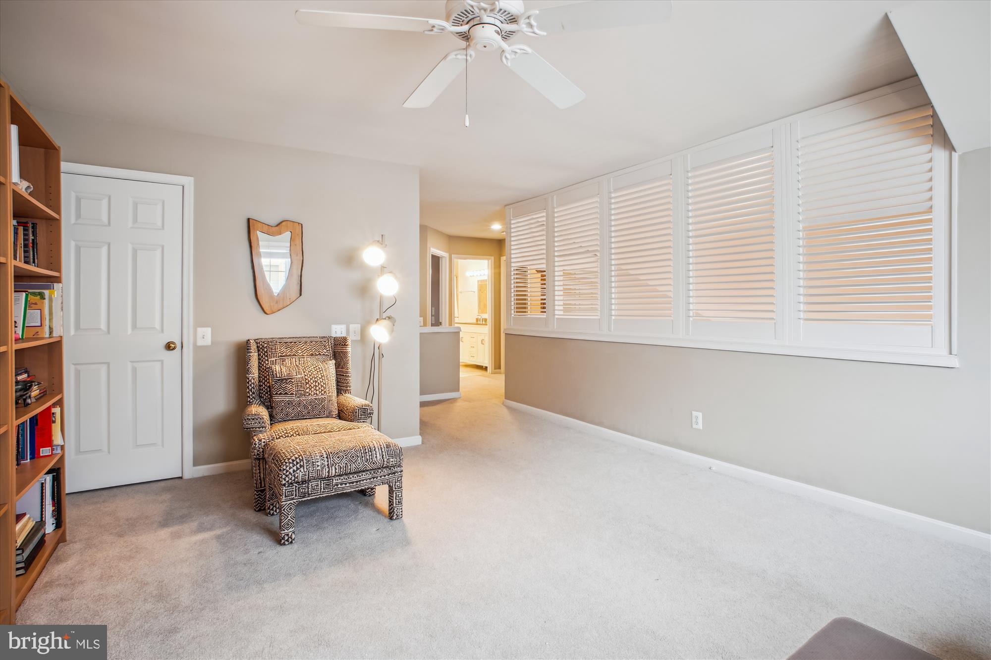 2454 Arctic Fox Way Reston, VA 20191 - Photo 35 of 54 a spacious bedroom with a bed and a chandelier
