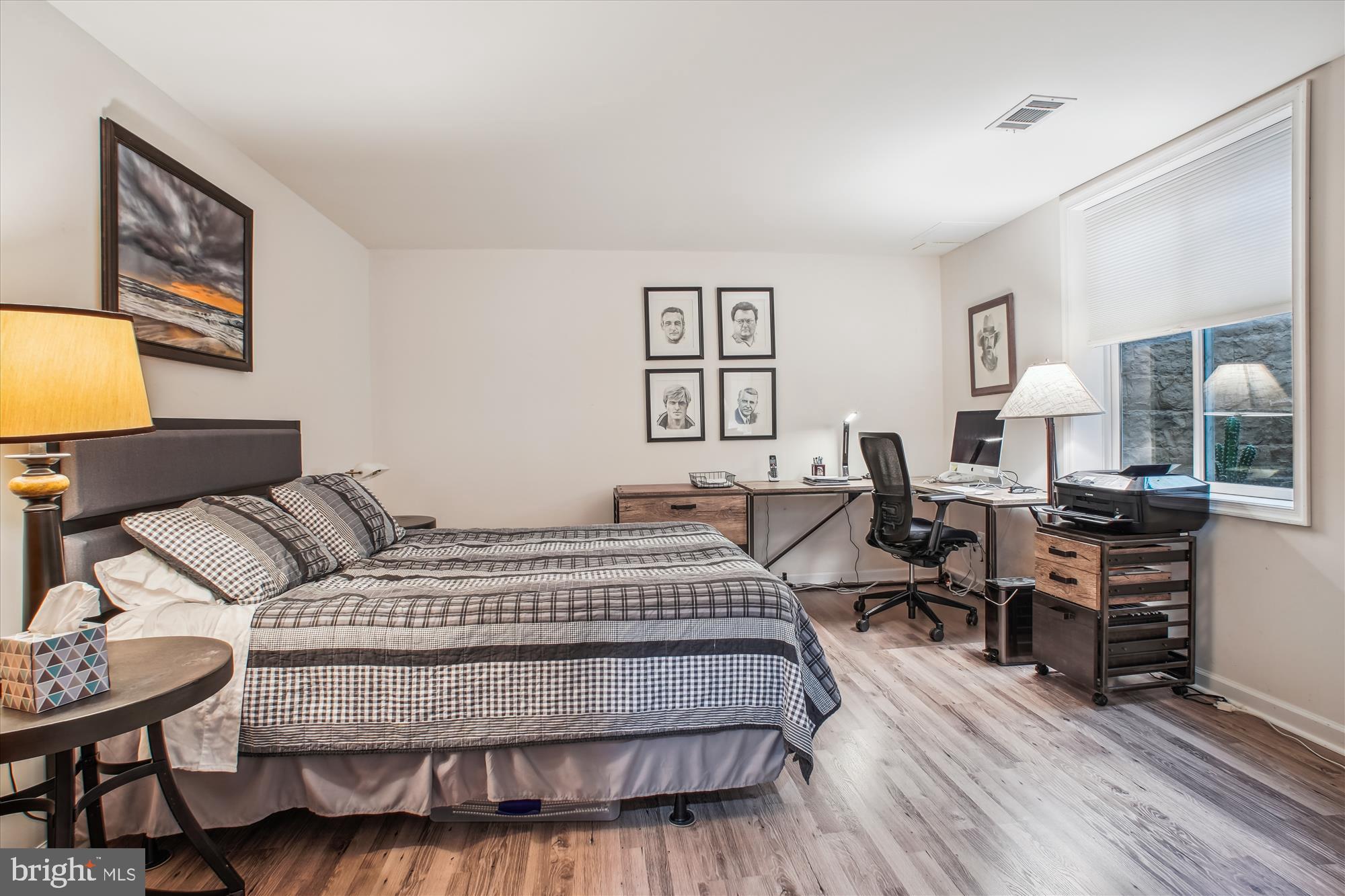 2454 Arctic Fox Way Reston, VA 20191 - Photo 40 of 54 a bedroom with a bed and wooden floor