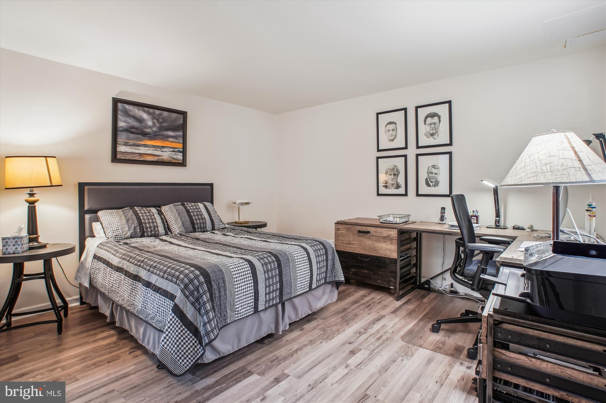 2454 Arctic Fox Way Reston, VA 20191 - Photo 41 of 54 a bedroom with a bed and a lamp on table