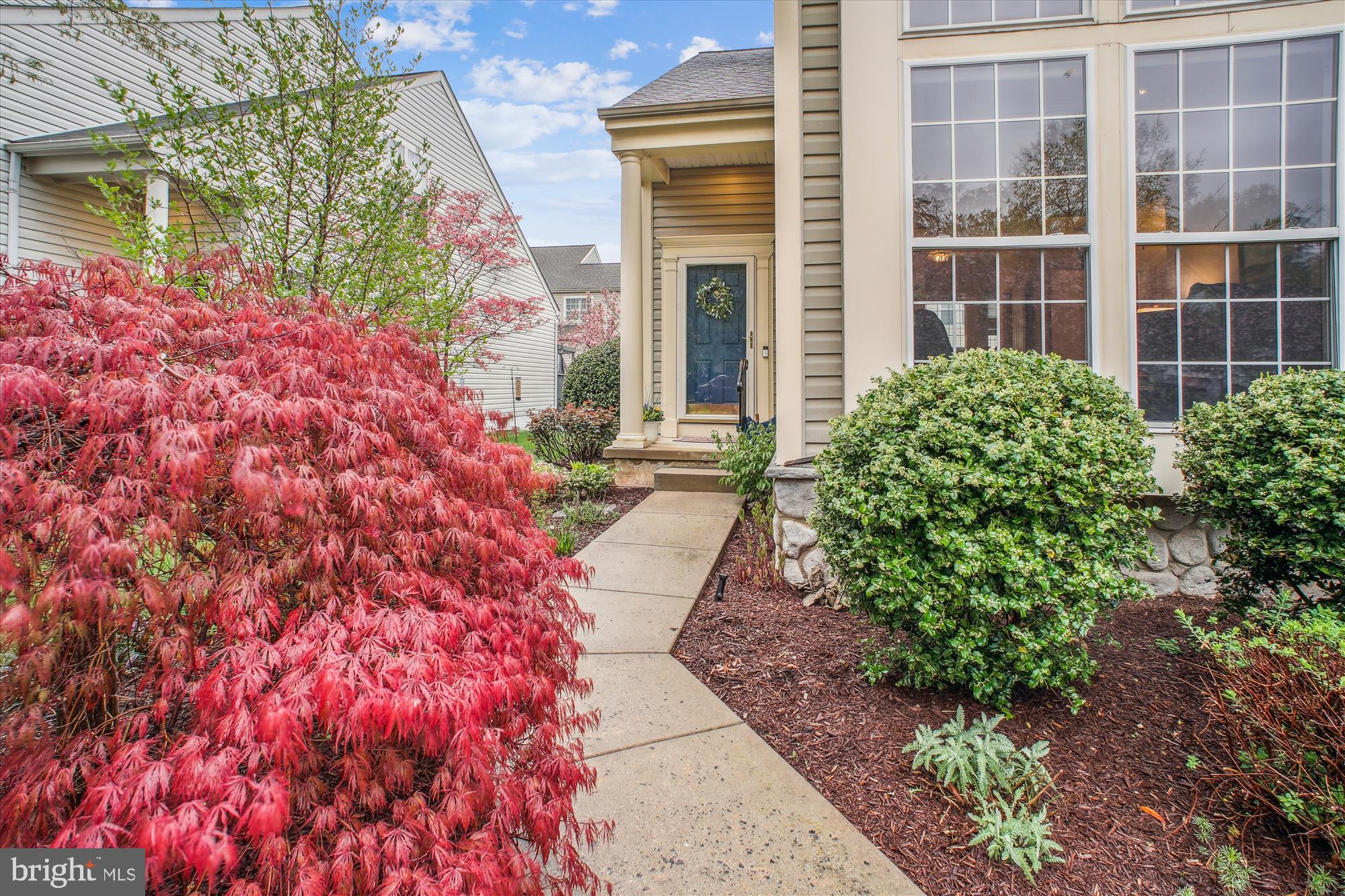 2454 Arctic Fox Way Reston, VA 20191 - Photo 46 of 54 a view of a pathway that has potted plants