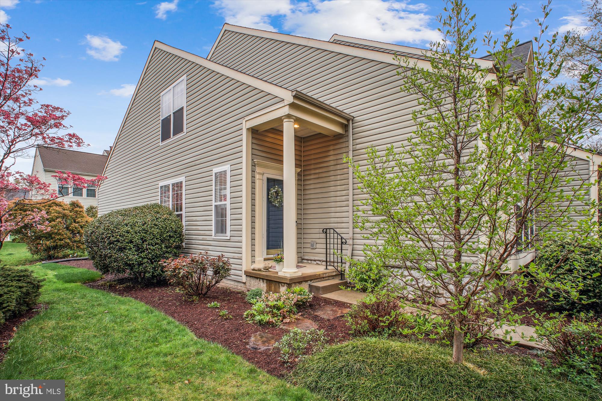 2454 Arctic Fox Way Reston, VA 20191 - Photo 53 of 54 a front view of a house with garden
