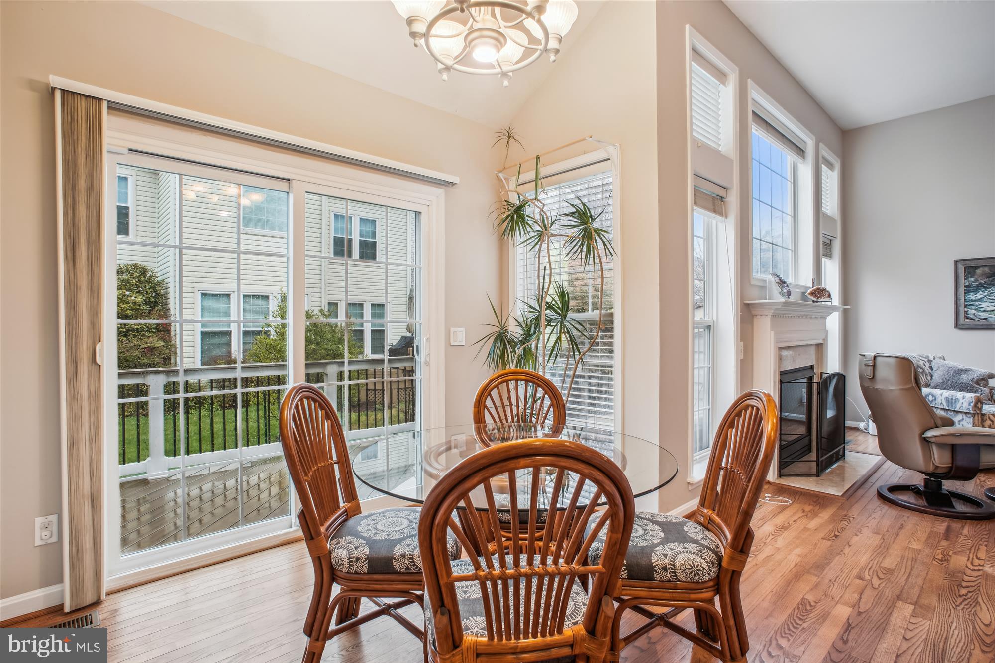 2454 Arctic Fox Way Reston, VA 20191 - Photo 9 of 54 a view of a dining room with furniture wooden floor and windows
