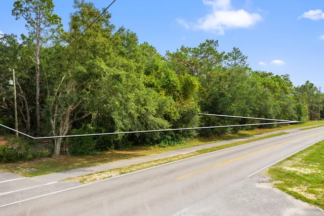a view of an ocean and a houses